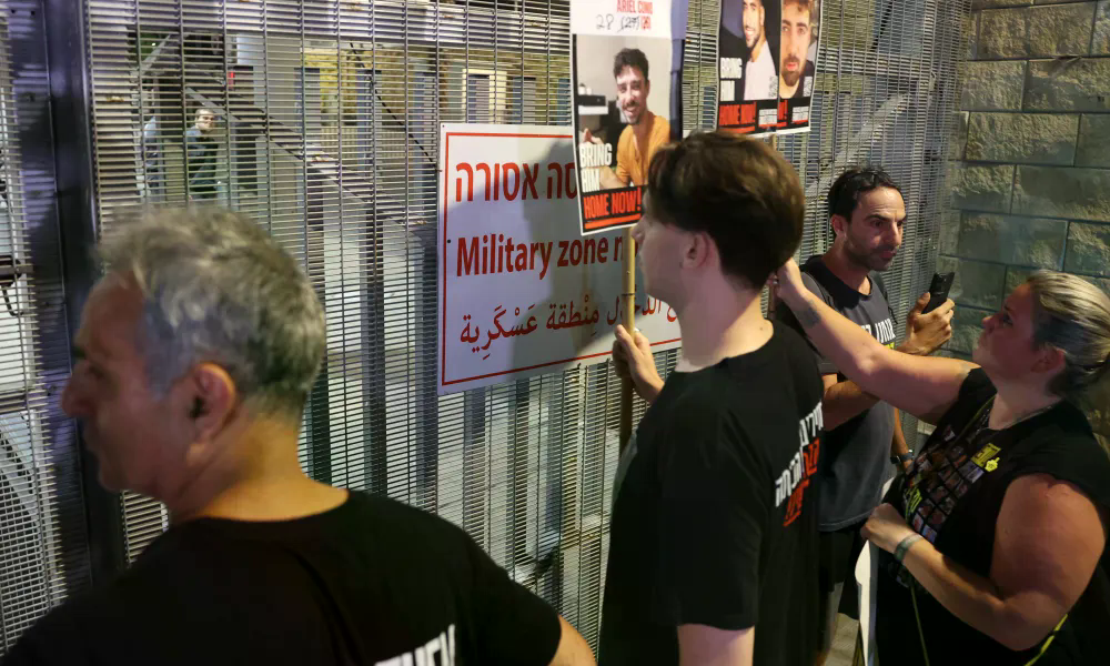 Israeli captive families confront police outside army headquarters